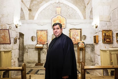 Greek Catholic priest Fadi Barki at the Monastery of St. Sergius and St. Bacchus in the Syrian town of Maaloula on December 17.