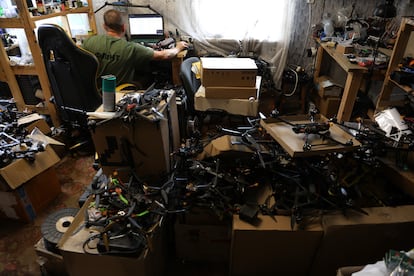 Amid some chaos, a dozen employees modify drones for the military to use as weapons near the front lines.